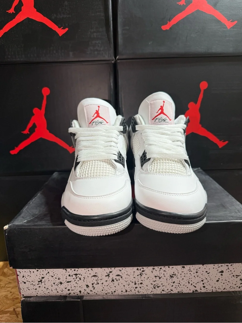 Jordan 4 Retro White Cement Athletic Sneakers in White and Gray
